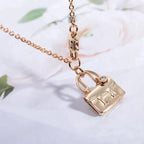 HERMES AMULETTE PEDANT ROSE GOLD NECKLACE