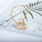 HERMES AMULETTE PEDANT ROSE GOLD NECKLACE