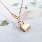 HERMES AMULETTE PEDANT ROSE GOLD NECKLACE