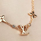 LOUIS VUITTON STAR AND SUN 7 MOTIFS GOLD BRACELET