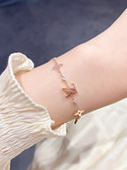 LOUIS VUITTON STAR AND SUN 7 MOTIFS GOLD BRACELET