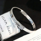 HERMES KELLY SILVER DIAMOND BRACELET