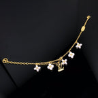 LOUIS VUITTON LOGO 6 MOTIF STAR AND SUN GOLD BRACELET