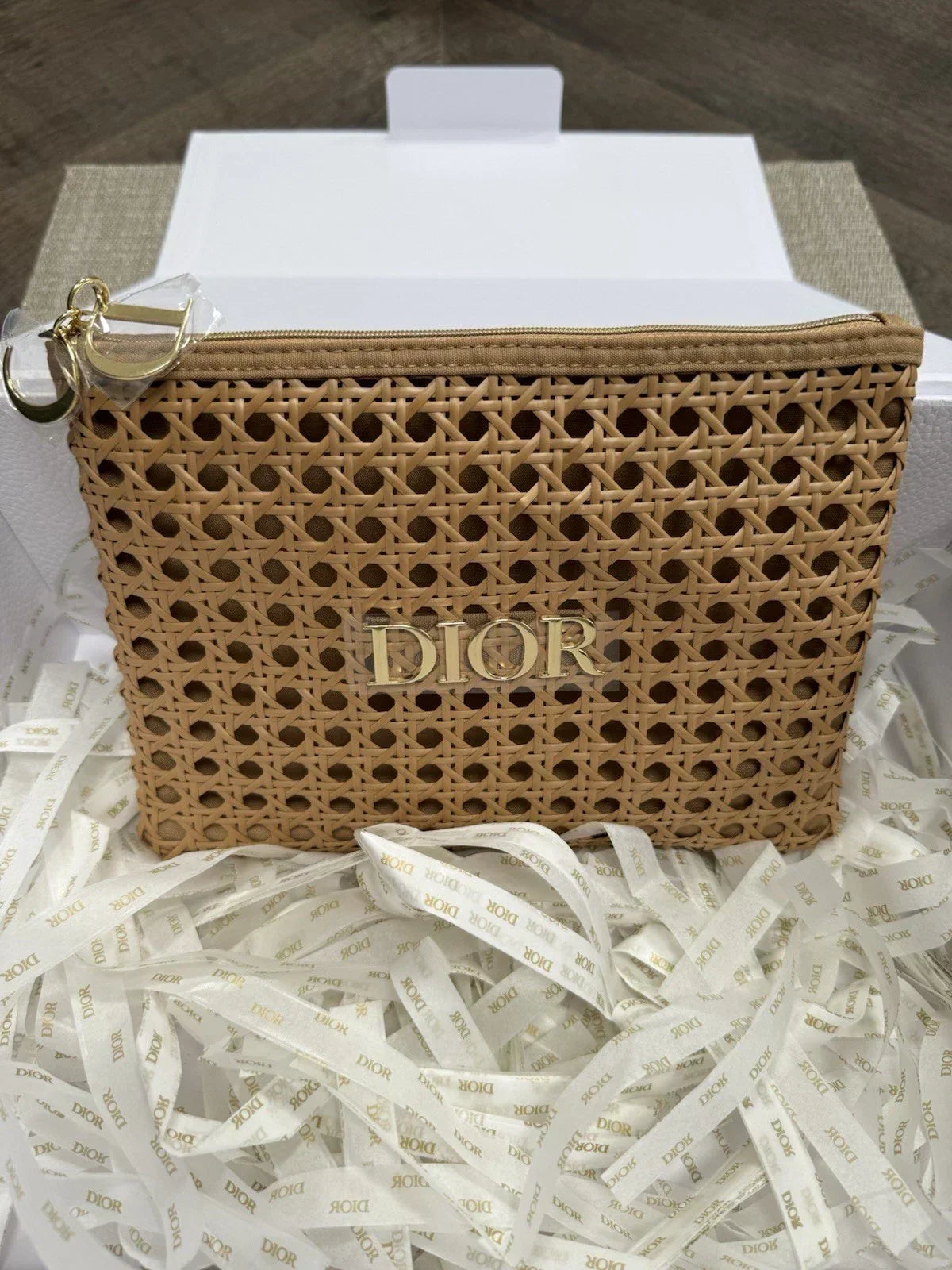 dior-raffia-solar-pouch-email ohter