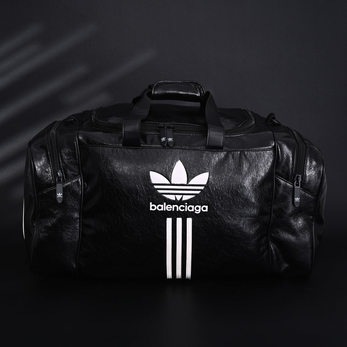 balenciaga-x-adidas-large-duffel-travel-bag-black-with-trefoil-logo-and-triple-stripes Handle