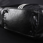 balenciaga-x-adidas-large-duffel-travel-bag-black-with-trefoil-logo-and-triple-stripes Handle