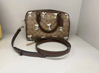 coach-x-peanuts-rowan-satchel-bag-signature-canvas Handle