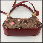 teri-shoulder-bag-signature-canvas-cherry-print Shoulder