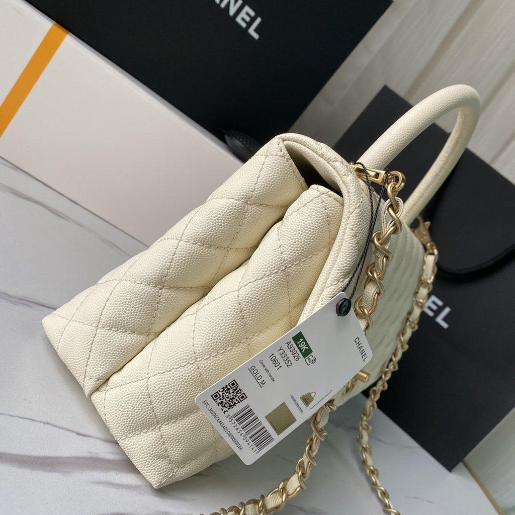 flap-bag-with-top-handle-1 Handle