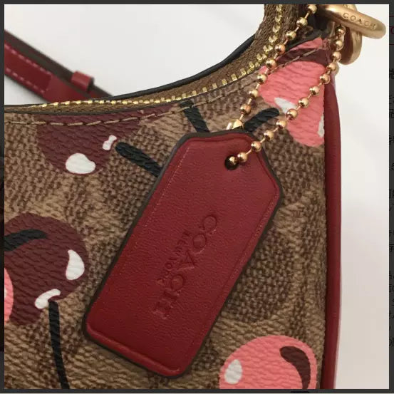 teri-shoulder-bag-signature-canvas-cherry-print Shoulder