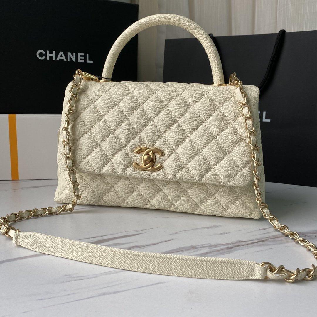 flap-bag-with-top-handle-1 Handle
