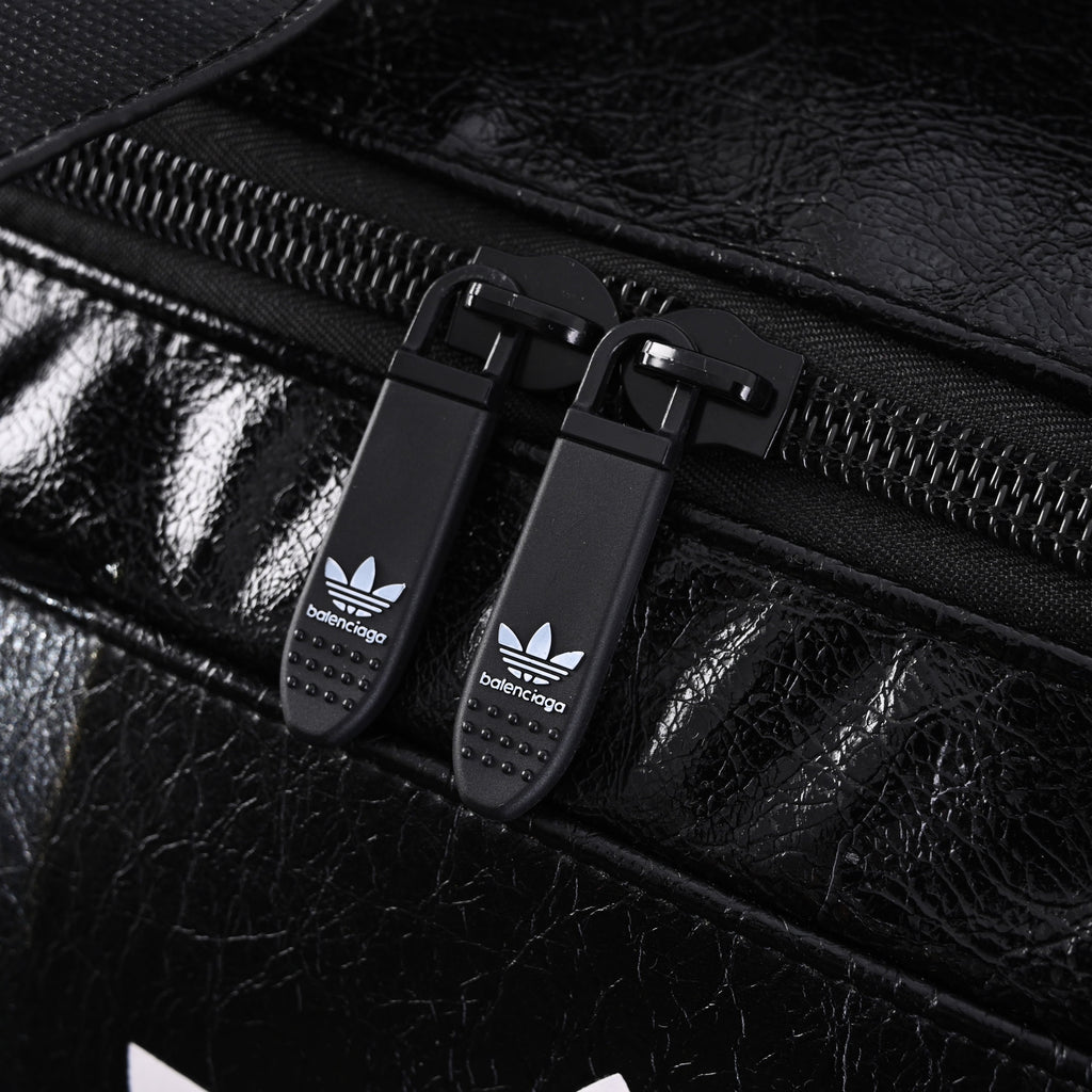 balenciaga-x-adidas-large-duffel-travel-bag-black-with-trefoil-logo-and-triple-stripes Handle