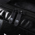 balenciaga-x-adidas-large-duffel-travel-bag-black-with-trefoil-logo-and-triple-stripes Handle