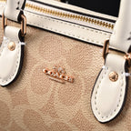 coach-rowan-satchel-signature-canvas-top-handle-bag-with-crossbody-strap-khaki-chalk Crossbody