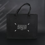 maison-margiela-mm6-tote-bag-limited-edition-black-canvas-shopper Tote