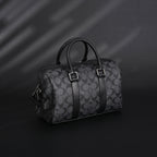 coach-signature-duffel-bag-black-monogram-canvas-with-leather-trim Handle