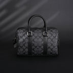 coach-signature-duffel-bag-black-monogram-canvas-with-leather-trim Handle