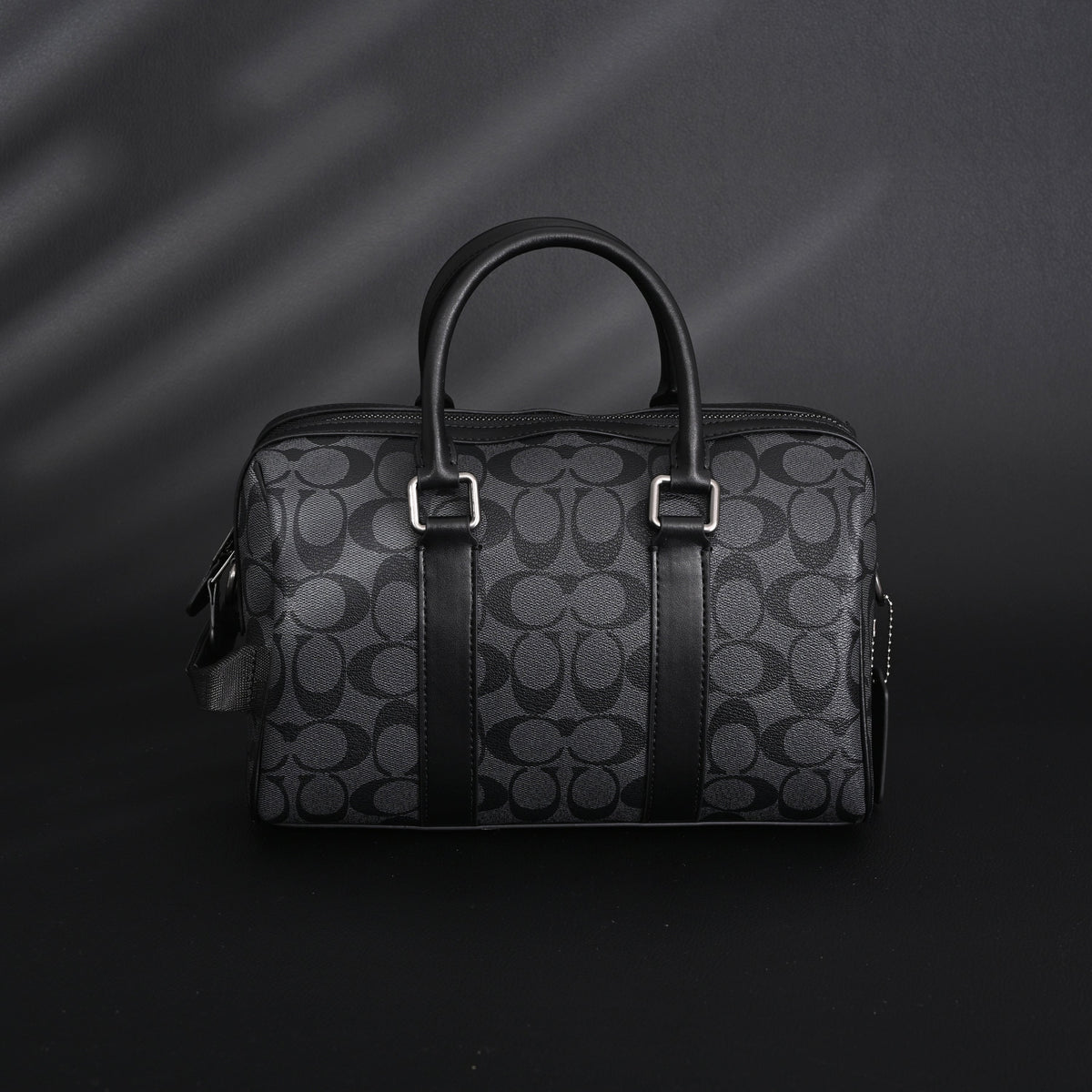 coach-signature-duffel-bag-black-monogram-canvas-with-leather-trim Handle
