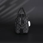coach-signature-duffel-bag-black-monogram-canvas-with-leather-trim Handle