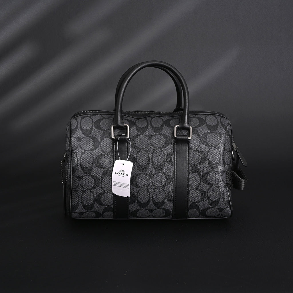 coach-signature-duffel-bag-black-monogram-canvas-with-leather-trim Handle