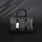 coach-signature-duffel-bag-black-monogram-canvas-with-leather-trim Handle