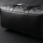 coach-signature-duffel-bag-black-monogram-canvas-with-leather-trim Handle