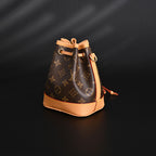 louis-vuitton-noe-bucket-bag-monogram-canvas-with-natural-leather-trim Crossbody