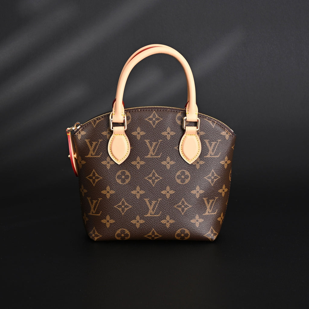 louis-vuitton-speedy-30-handbag-monogram-canvas-with-leather-trim Handle