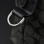coach-metropolitan-duffel-bag-in-signature-black-canvas Handle