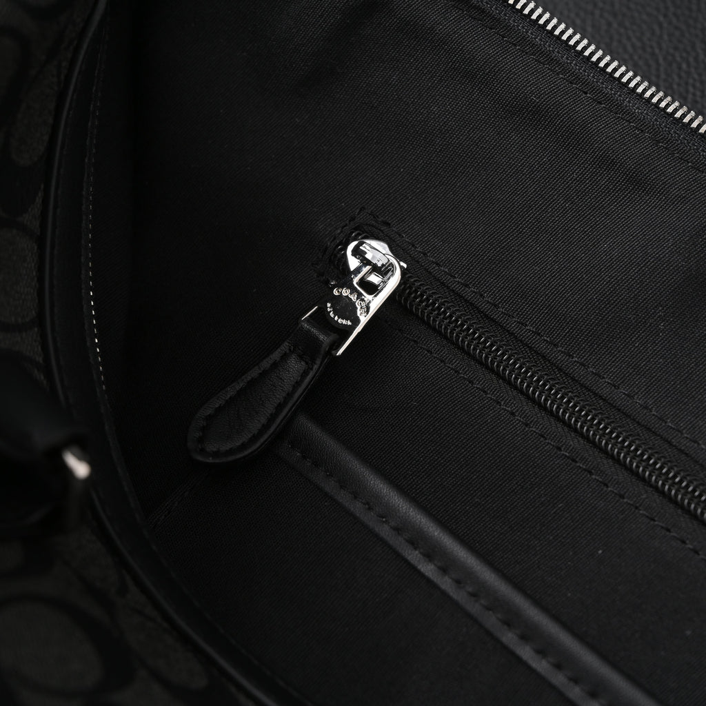coach-metropolitan-duffel-bag-in-signature-black-canvas Handle