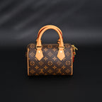 louis-vuitton-speedy-bandouliere-25-monogram-canvas Handle