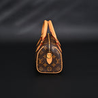 louis-vuitton-speedy-bandouliere-25-monogram-canvas Handle