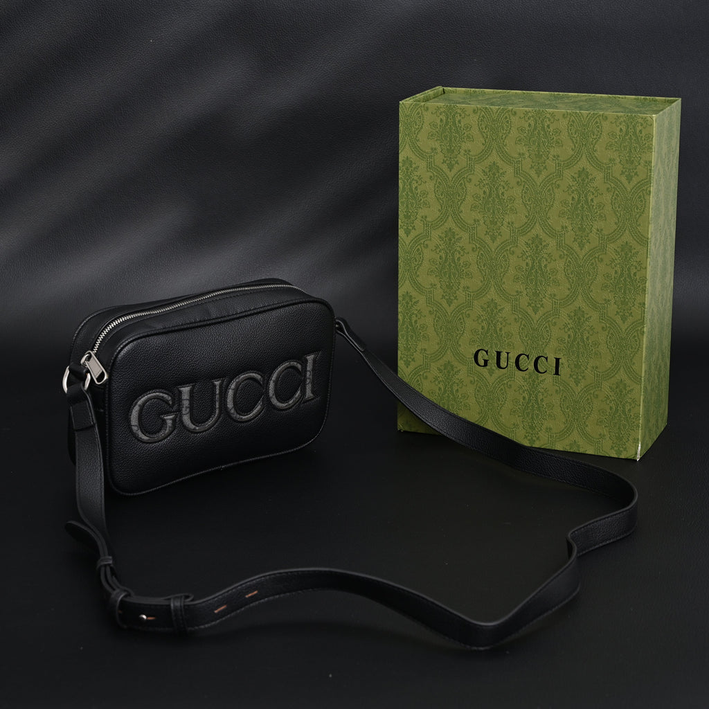 gucci-black-leather-embossed-logo-belt-bag Crossbody