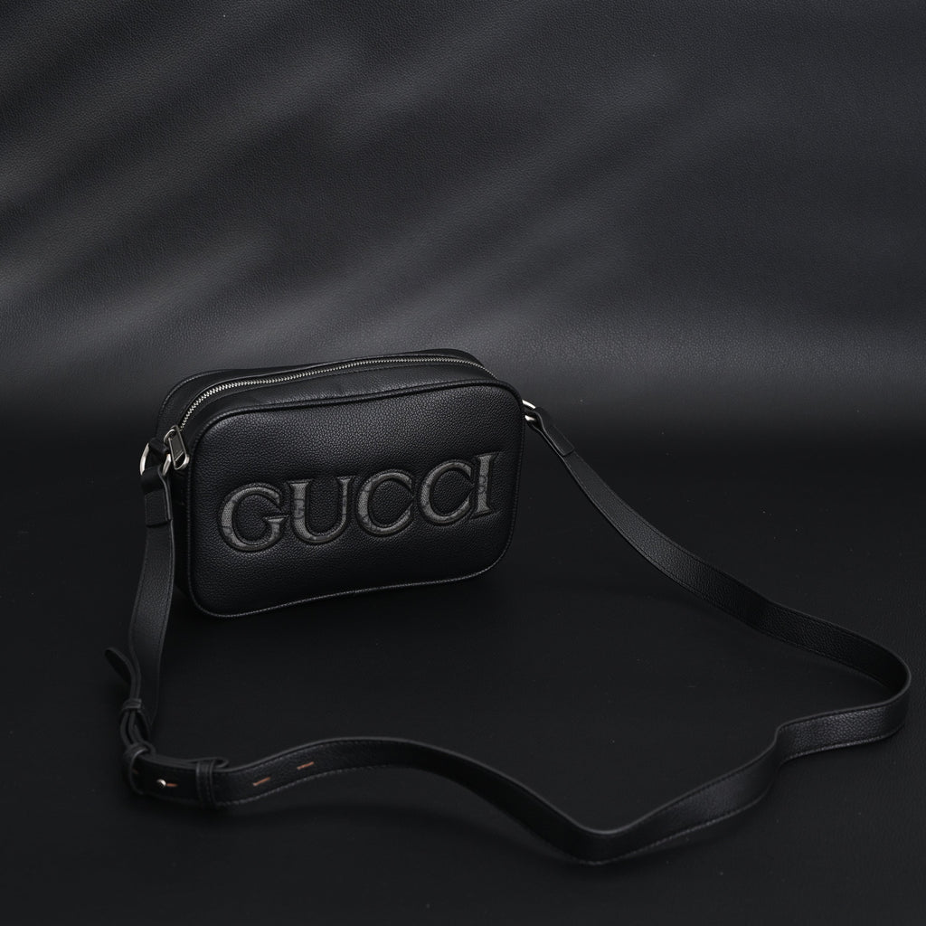 gucci-black-leather-embossed-logo-belt-bag Crossbody
