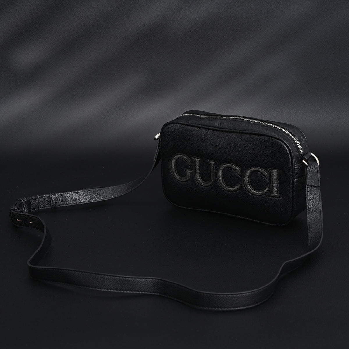 gucci-black-leather-embossed-logo-belt-bag Crossbody