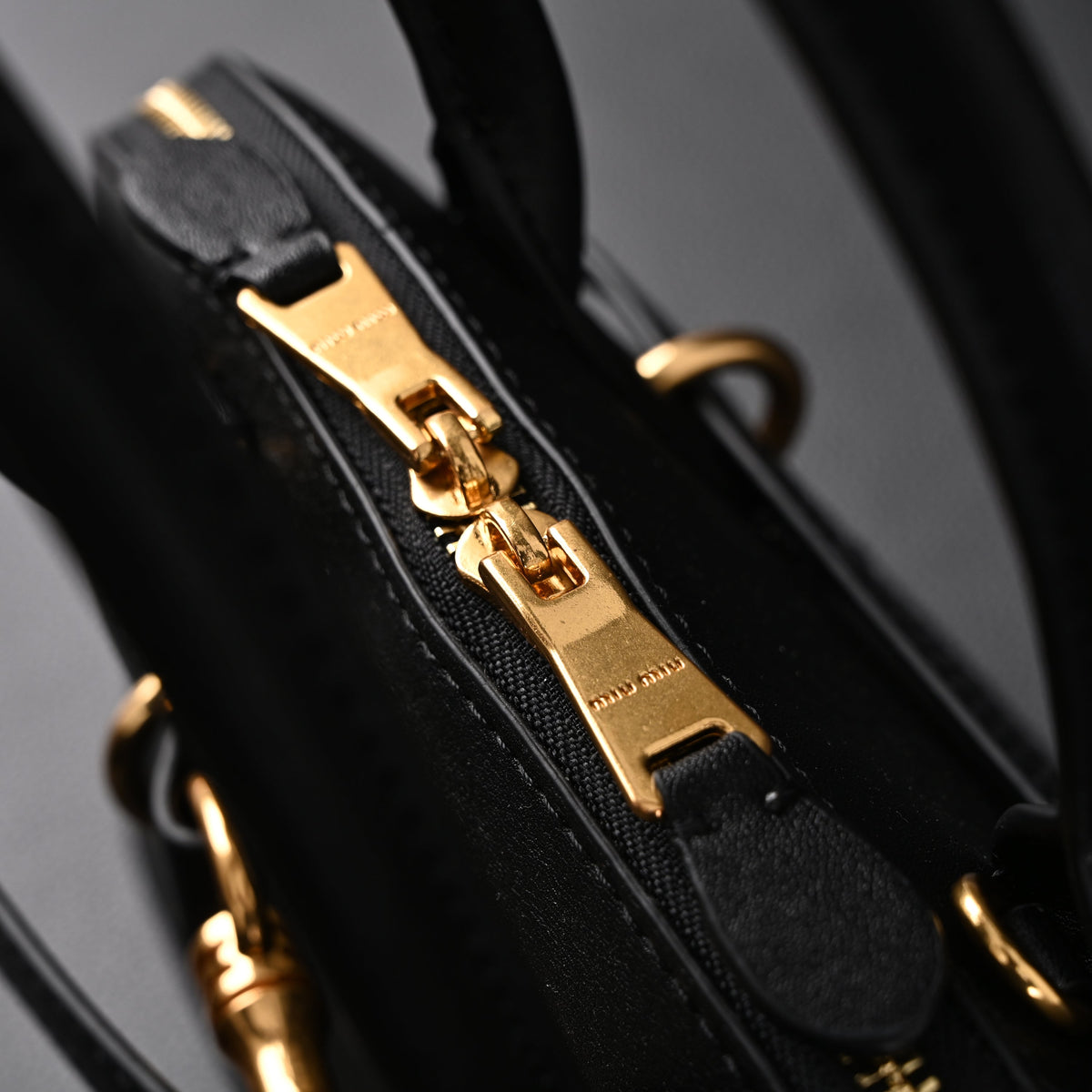 miu-miu-black-leather-satchel-bag-medium-structured-tote-1 Handle