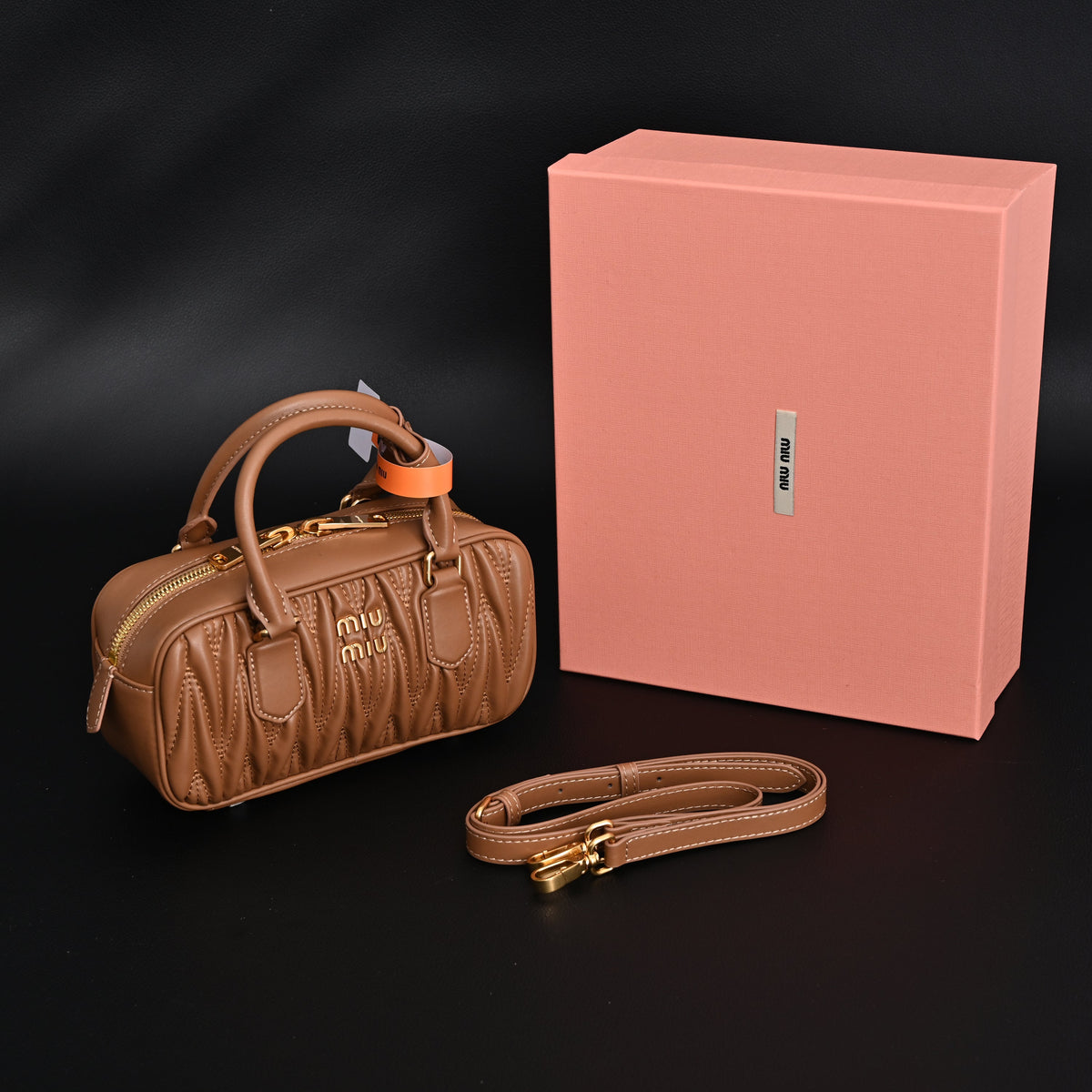 miu-miu-matelasse-leather-top-handle-bag-caramel-brown Handle