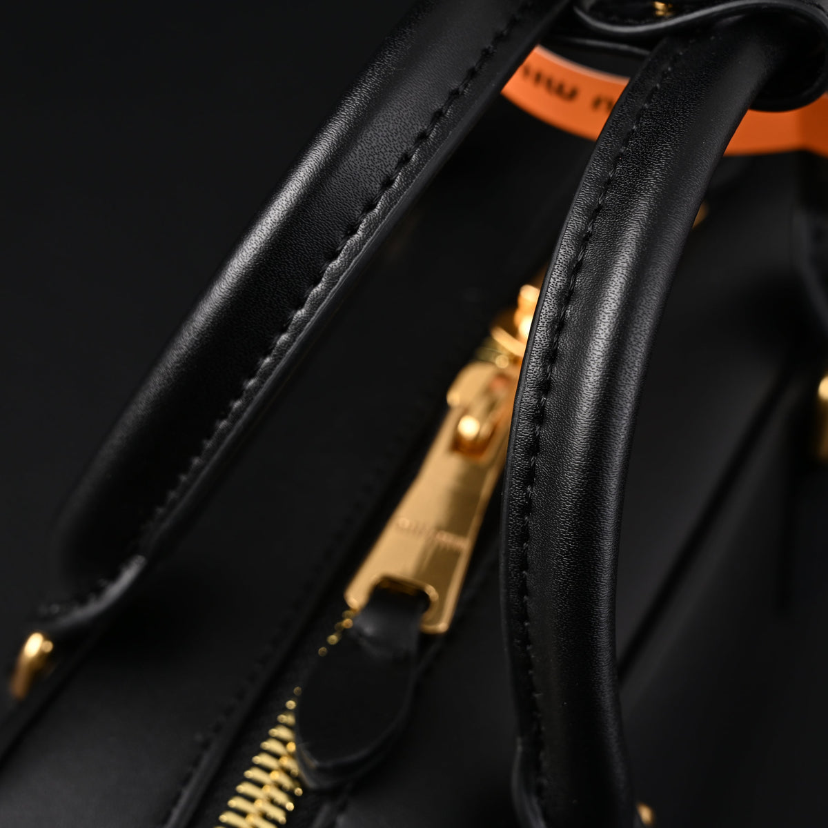 miu-miu-black-matelasse-leather-satchel-bag-mini-top-handle Handle