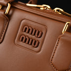 miu-miu-leather-top-handle-satchel-caramel-brown Handle