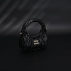 miu-miu-matelasse-leather-hobo-bag-black-with-gold-hardware Handle