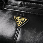 prada-cleo-black-patent-leather-shoulder-bag-with-gold-hardware Shoulder
