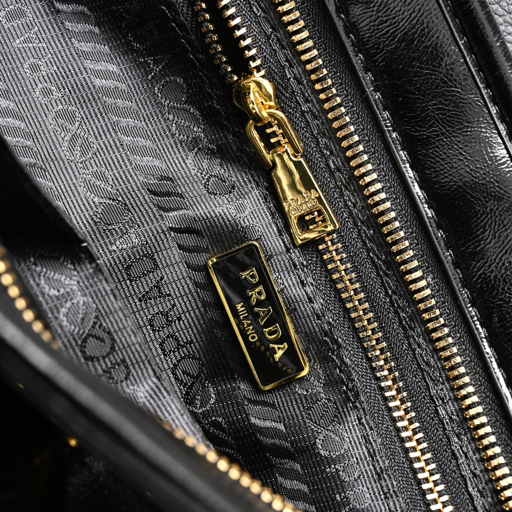 prada-cleo-black-patent-leather-shoulder-bag-with-gold-hardware Shoulder