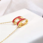 HERMES HM CLIC RED ENAMEL GOLD NECKLACE