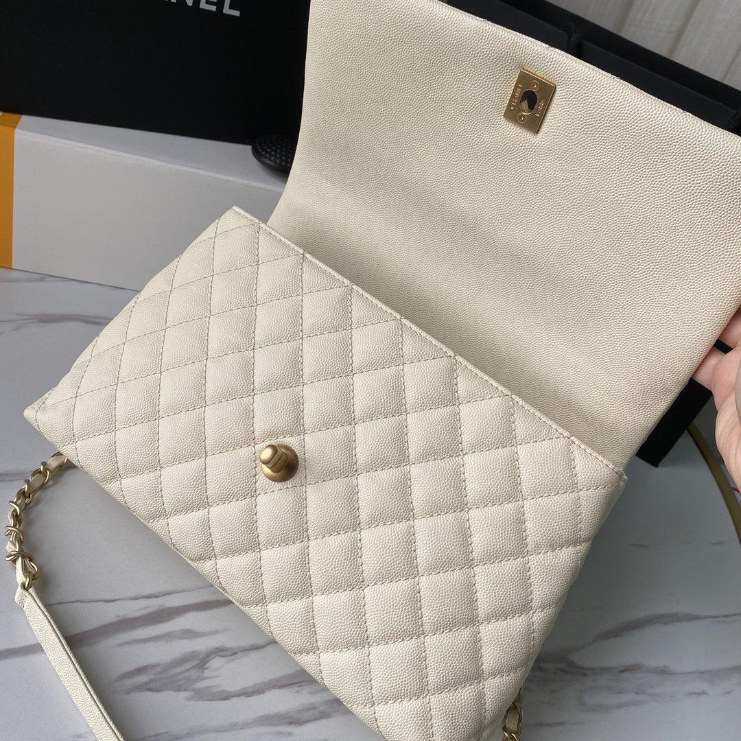 flap-bag-with-top-handle-1 Handle