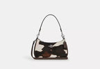 teri-shoulder-bag-with-cow-print Shoulder