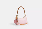 pink-teri-shoulder-bag-in-signature-canvas Shoulder