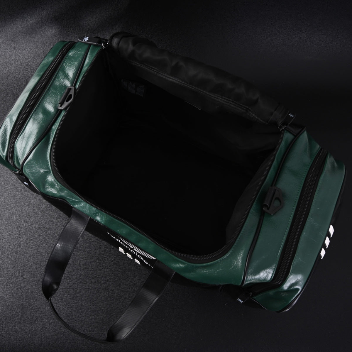balenciaga-x-adidas-large-duffel-travel-bag-black-green-with-trefoil-logo-and-triple-stripes Handle